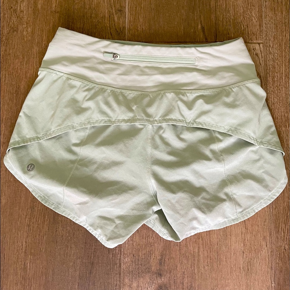 LULULEMON mint green speed up shorts 4in